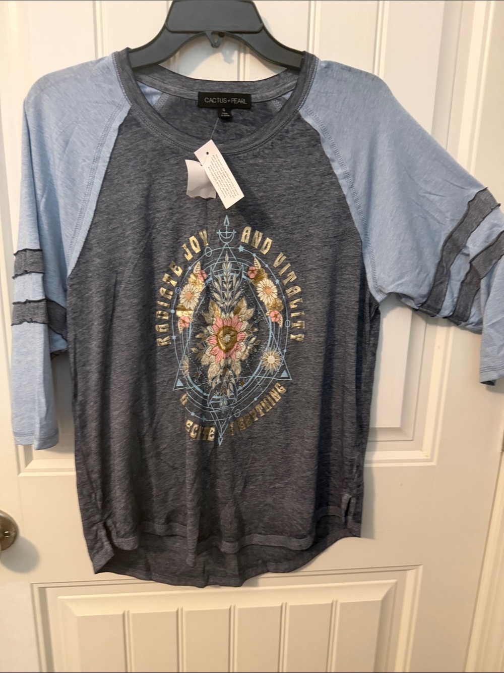 Cactus + Pearl  women’s raglan t-shirt featuring a vintage-style floral graphic